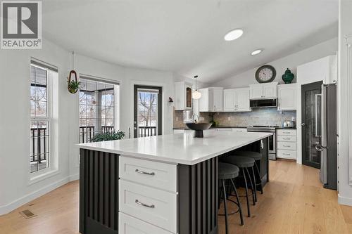 QUARTZ COUNTERTOPS - 140 Allen Crescent, Vulcan, AB - Indoor Photo Showing Kitchen With Upgraded Kitchen