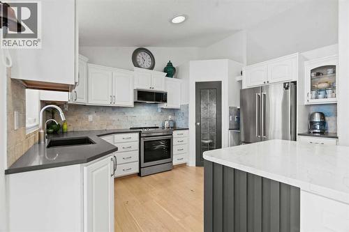 STAINLESS STEEL APPLIANCES - 140 Allen Crescent, Vulcan, AB - Indoor Photo Showing Kitchen With Stainless Steel Kitchen With Upgraded Kitchen