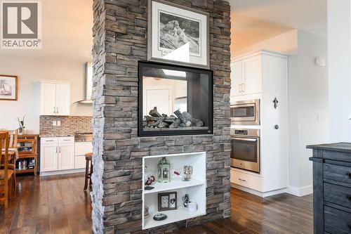 127 Westgate Drive, Coaldale, AB - Indoor With Fireplace