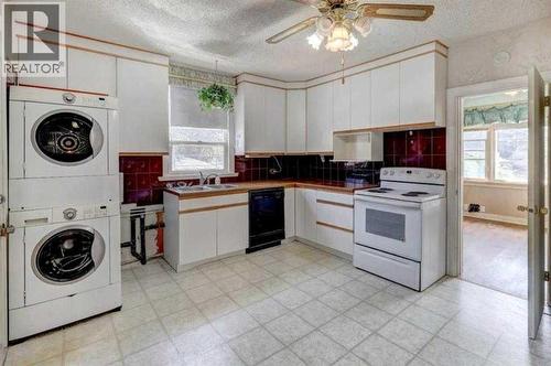 1402 Crescent Road Nw, Calgary, AB - Indoor Photo Showing Laundry Room