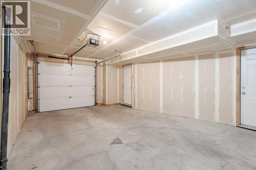 122 Panamount Drive Nw, Calgary, AB - Indoor Photo Showing Garage