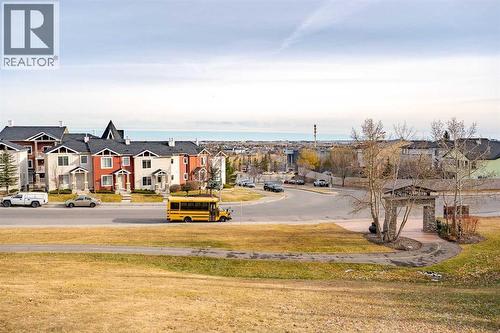 facing to the green space - 122 Panamount Drive Nw, Calgary, AB - Outdoor With View