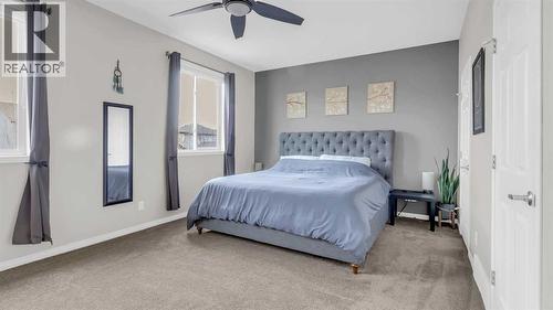 1120 Windhaven Close Sw, Airdrie, AB - Indoor Photo Showing Bedroom
