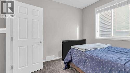 1120 Windhaven Close Sw, Airdrie, AB - Indoor Photo Showing Bedroom