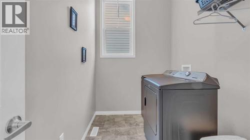 1120 Windhaven Close Sw, Airdrie, AB - Indoor Photo Showing Laundry Room