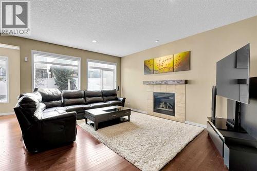 88 Nolanfield Crescent Nw, Calgary, AB - Indoor Photo Showing Living Room With Fireplace