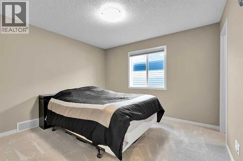 88 Nolanfield Crescent Nw, Calgary, AB - Indoor Photo Showing Bedroom