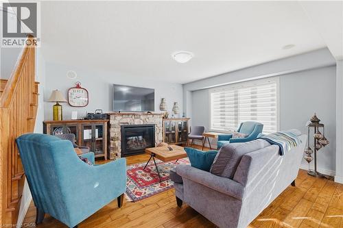 23 Doon Creek Street, Kitchener, ON - Indoor Photo Showing Living Room With Fireplace