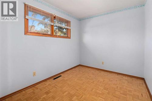 2nd Bedroom - Main Floor - 1423 18A Street Ne, Calgary, AB - Indoor Photo Showing Other Room