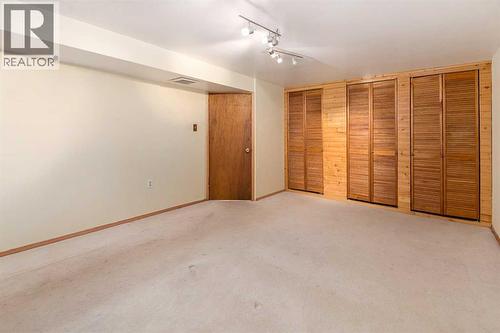 Large Closets and Storage  - Basement  Bedroom 4 - 1423 18A Street Ne, Calgary, AB - Indoor Photo Showing Other Room