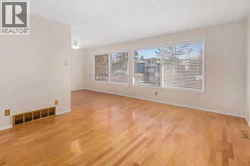 Large Living Dining Room Open Concept - 1423 18A Street Ne, Calgary, AB - Indoor Photo Showing Other Room