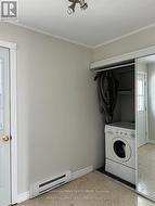 Unit # 3 -  Den/Laundry - 