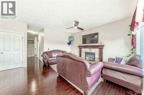 71 Martha'S Meadow Close Ne, Calgary, AB - Indoor Photo Showing Living Room With Fireplace