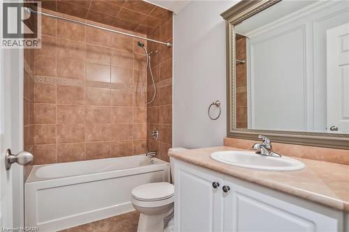 Full bath featuring bathing tub / shower combination and vanity - 42 Madonna Drive, Hamilton, ON - Indoor Photo Showing Bathroom