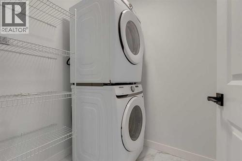 367 Fireside Drive, Cochrane, AB - Indoor Photo Showing Laundry Room