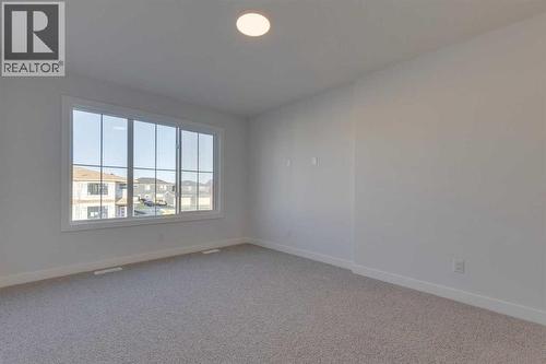 367 Fireside Drive, Cochrane, AB - Indoor Photo Showing Other Room