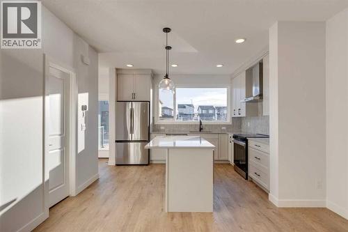 367 Fireside Drive, Cochrane, AB - Indoor Photo Showing Kitchen With Upgraded Kitchen