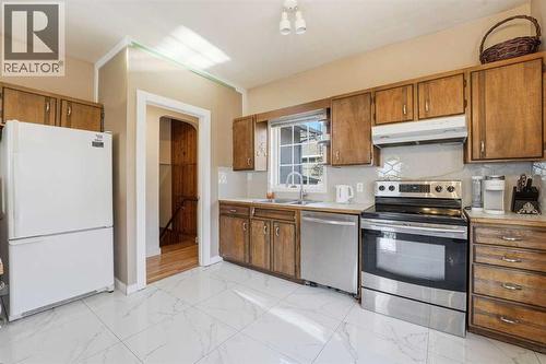 2314 Richmond Road Sw, Calgary, AB - Indoor Photo Showing Kitchen With Double Sink