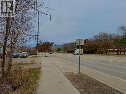 standing on the sidewalk looking south down the street. - 3708 25 Avenue, Vernon, BC - Outdoor With View