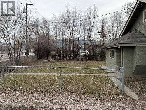 standing on the driveway looking north across the front yard. - 3708 25 Avenue, Vernon, BC - Outdoor