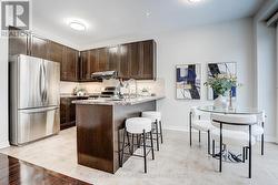 Modern kitchen with Stainless steel appliances - 