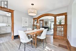 Dining Room With Bay Window, Rich Wood Trim - 
