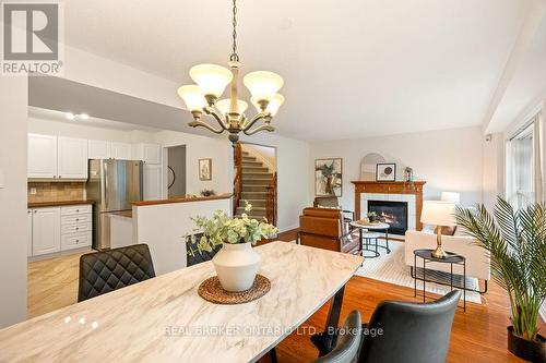2 Sherring Crescent, Ottawa, ON - Indoor Photo Showing Dining Room With Fireplace