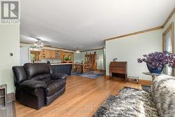 OPEN LIVING ROOM AREA FACING SOUTH - 