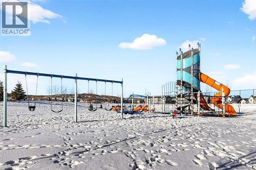 Community amenities - 64 Creekside Drive Sw, Calgary, AB - Outdoor