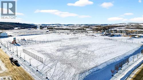 Community amenities - 64 Creekside Drive Sw, Calgary, AB - Outdoor With View