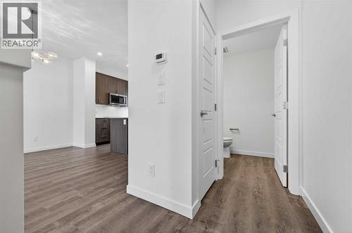 Entryway - 64 Creekside Drive Sw, Calgary, AB - Indoor Photo Showing Other Room