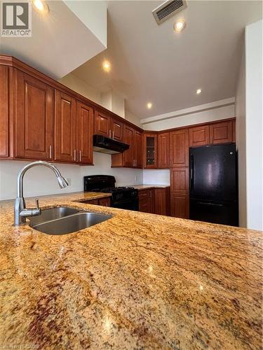 130 Wellington Street N Unit# 201, Hamilton, ON - Indoor Photo Showing Kitchen With Double Sink
