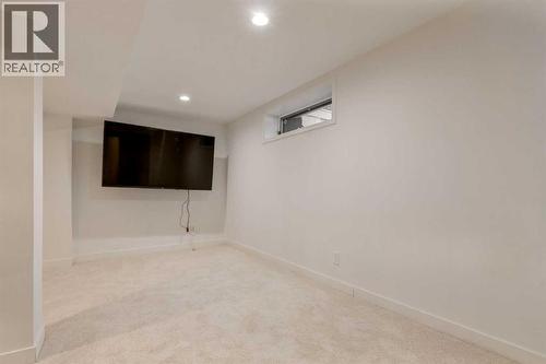 113 Straddock Terrace Sw, Calgary, AB - Indoor Photo Showing Other Room