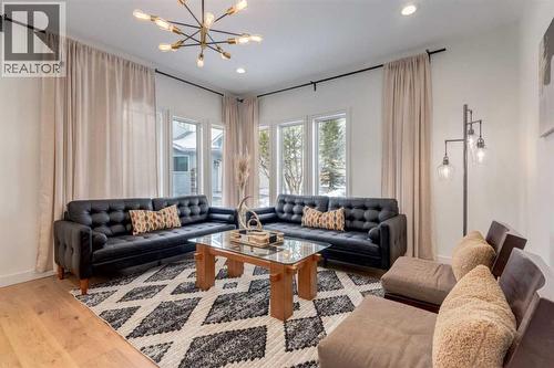 113 Straddock Terrace Sw, Calgary, AB - Indoor Photo Showing Living Room