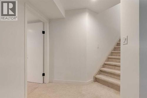 113 Straddock Terrace Sw, Calgary, AB - Indoor Photo Showing Other Room