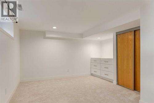 113 Straddock Terrace Sw, Calgary, AB - Indoor Photo Showing Other Room