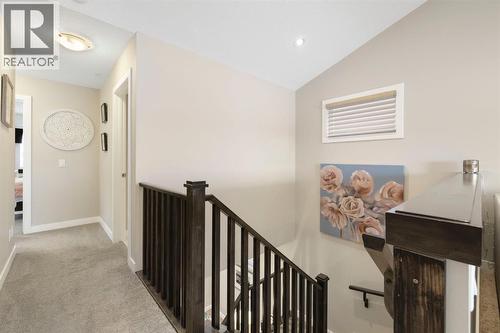 8 Emberside Glen, Cochrane, AB - Indoor Photo Showing Other Room