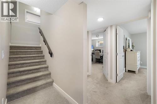 8 Emberside Glen, Cochrane, AB - Indoor Photo Showing Other Room