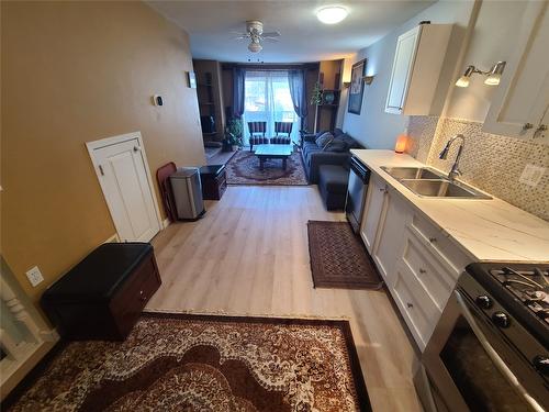 107-335 33 Highway, Kelowna, BC - Indoor Photo Showing Kitchen With Double Sink
