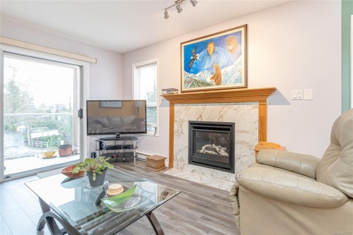 305B-3000 Oak St, Chemainus, BC - Indoor Photo Showing Living Room With Fireplace