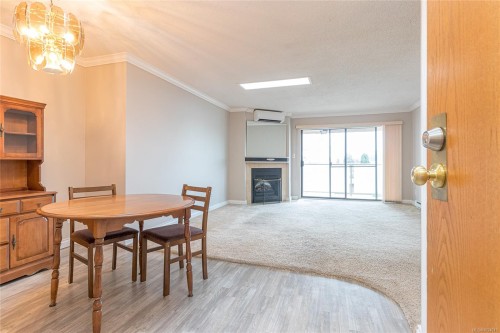 #402-435 Festubert St, Duncan, BC - Indoor Photo Showing Dining Room With Fireplace