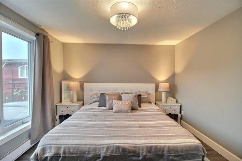 Chambre à coucher principale - 30 Rue Thibault, Val-D'Or, QC - Indoor Photo Showing Bedroom