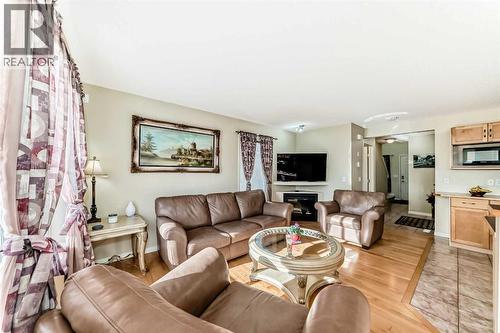 116 Hidden Creek Rise Nw, Calgary, AB - Indoor Photo Showing Living Room