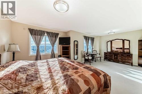 116 Hidden Creek Rise Nw, Calgary, AB - Indoor Photo Showing Bedroom