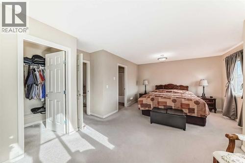 116 Hidden Creek Rise Nw, Calgary, AB - Indoor Photo Showing Bedroom