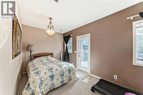 116 Hidden Creek Rise Nw, Calgary, AB - Indoor Photo Showing Bedroom