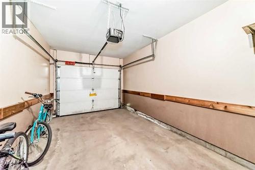 116 Hidden Creek Rise Nw, Calgary, AB - Indoor Photo Showing Garage