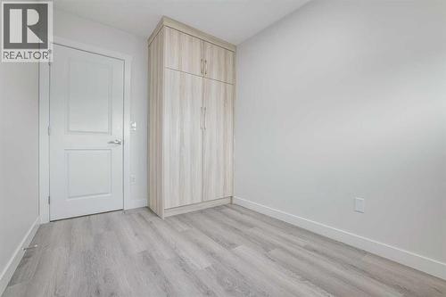 152 Falconridge Crescent Ne, Calgary, AB - Indoor Photo Showing Other Room