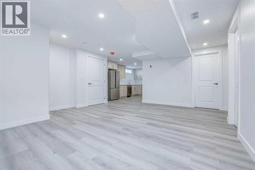 152 Falconridge Crescent Ne, Calgary, AB - Indoor Photo Showing Other Room