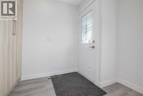 152 Falconridge Crescent Ne, Calgary, AB - Indoor Photo Showing Other Room